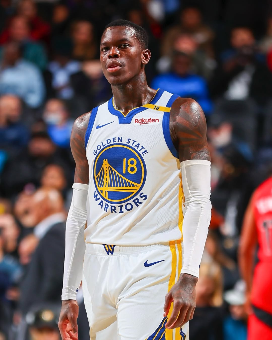 Dennis Schröder wearing a Warriors uniform